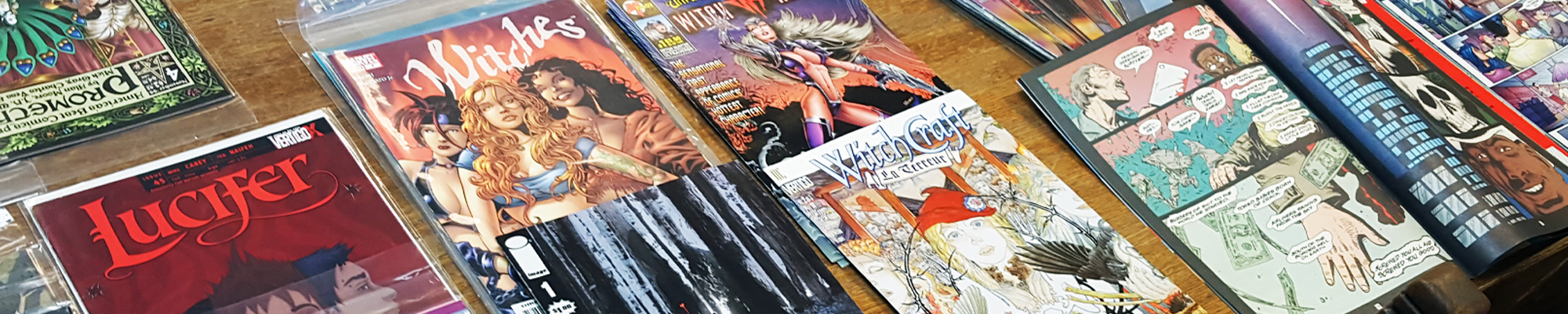 comics on table from library collection